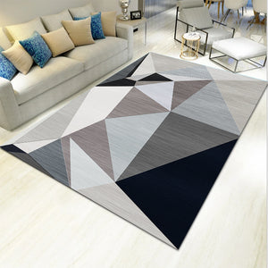 Several light geometric carpet mats