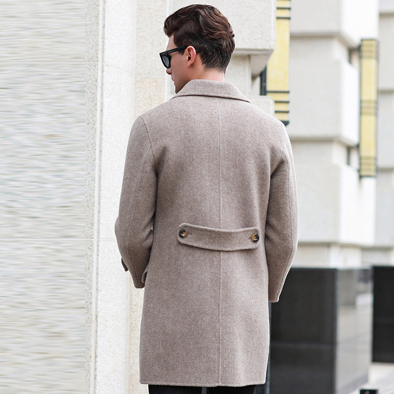 Double-breasted mid-length woolen coat