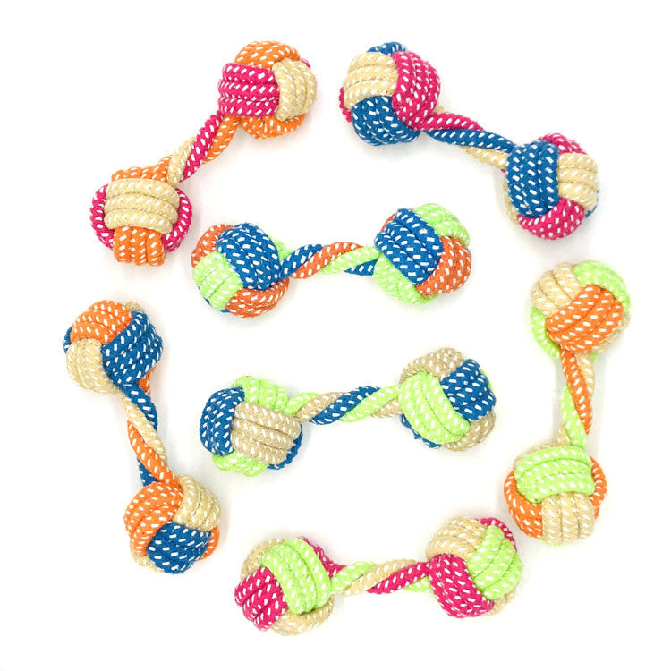 Dog bites cotton rope toy