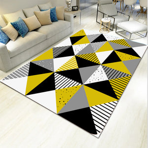 Several light geometric carpet mats