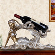 Beautifully designed mermaid  wine bottle holder. resin