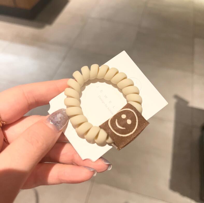 The New Milk Tea Color Frosted Matte Hair Circle Smiley Face Hair Rope Girl Tie Hair Holster